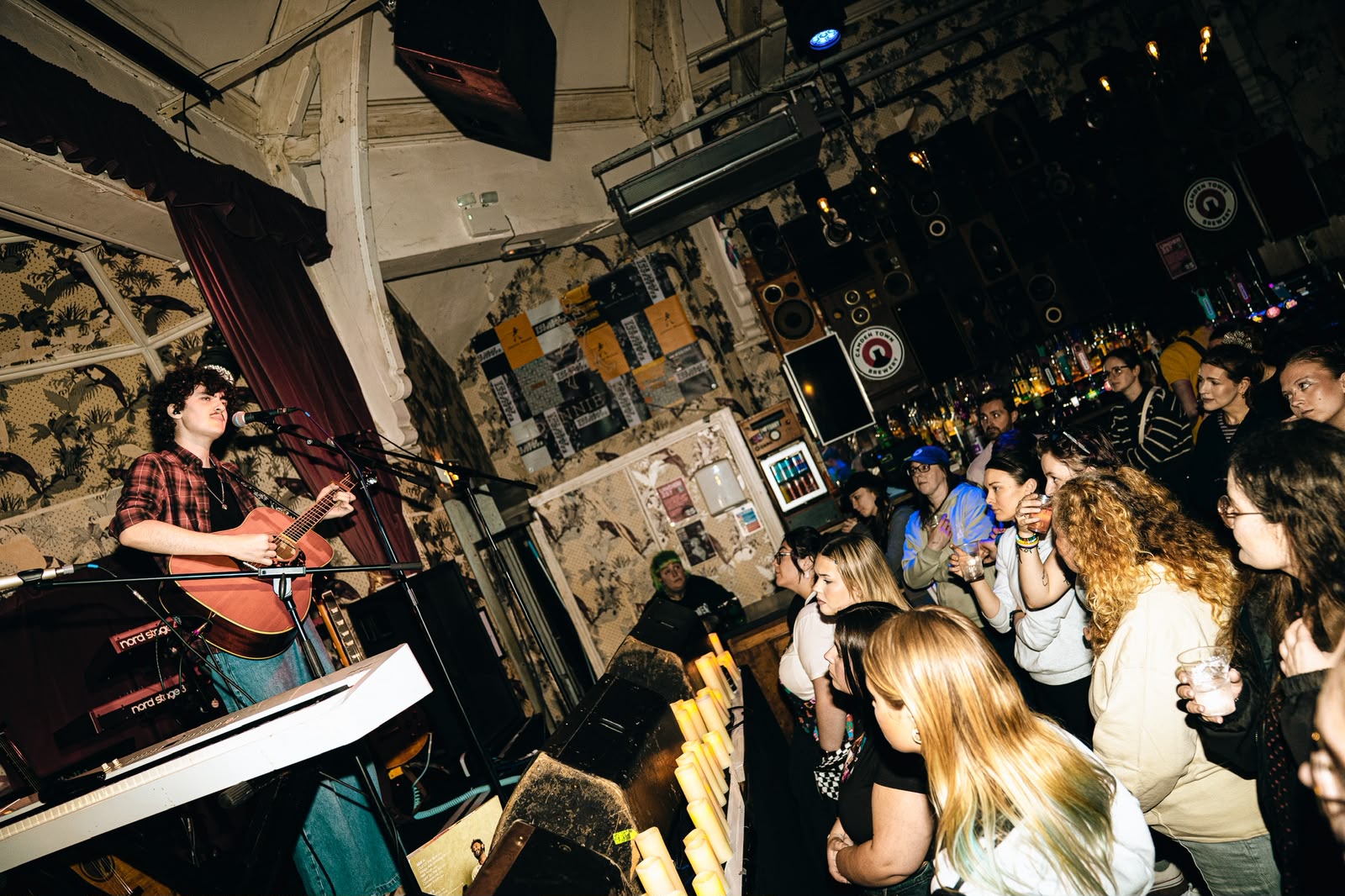 Harry Huxley performing at an intimate show